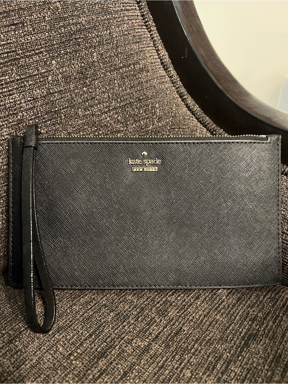 kate spade New York Black Saffiano Wristlet with Gold Logo